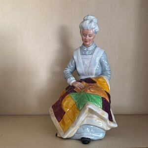 Royal Doulton Porcelain Figurine with Colorful Quilt